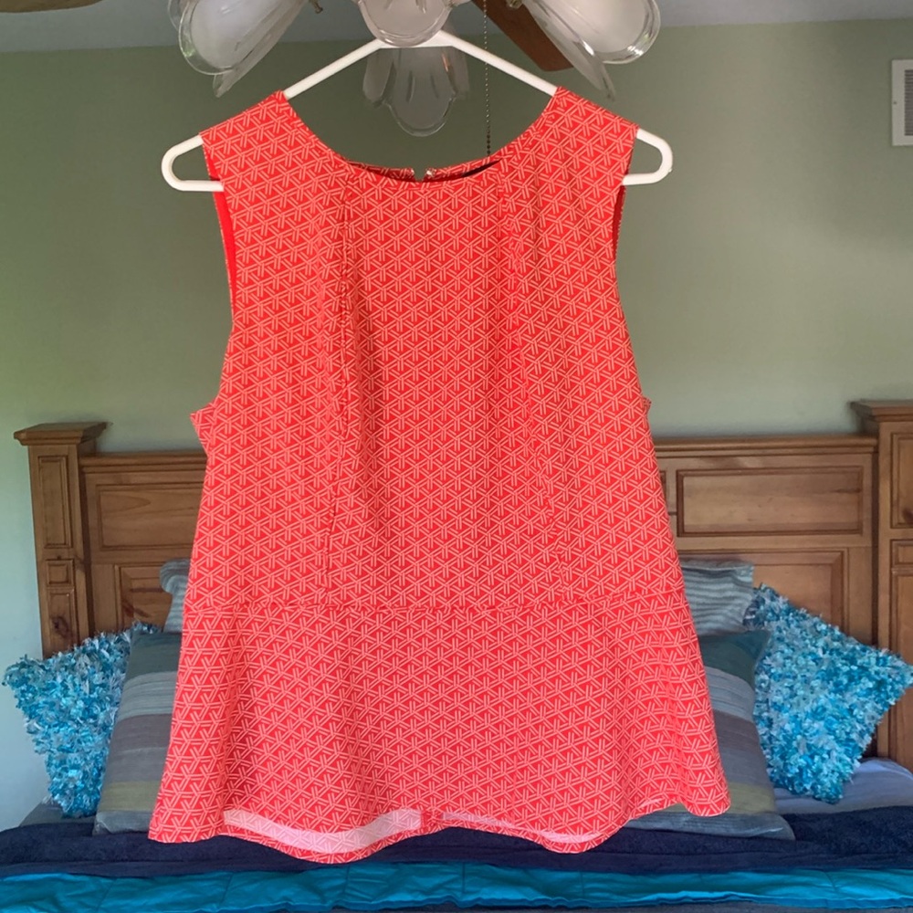 Sleeveless peplum blouse